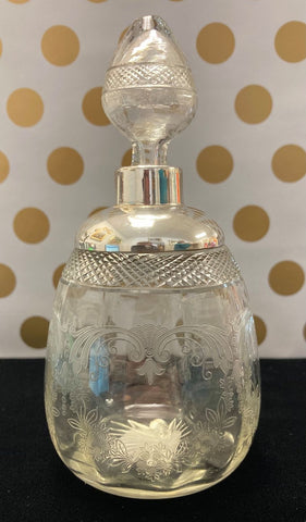 Etched glass perfume bottle