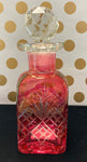 Cranberry glass perfume bottle