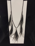 Black feathered diamante necklace