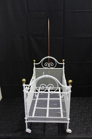 Victorian wrought iron doll's cot