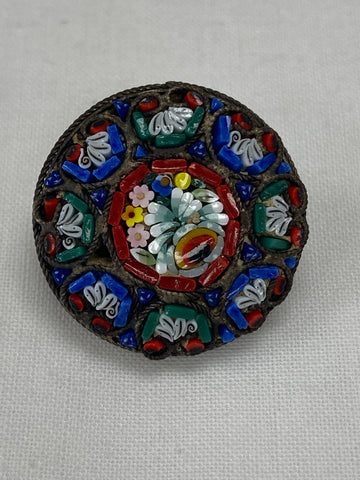 Small round colourful brooch made in Italy
